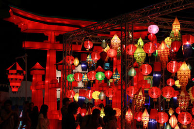 Illuminated lanterns hanging at night