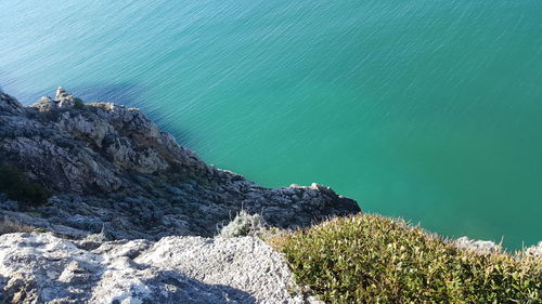 High angle view of rock formation in sea