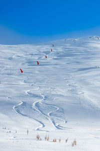 View of the ski slopes in the snow. traces left by skiers in the snow