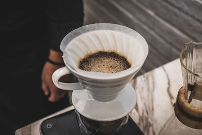 High angle view of coffee cup on table