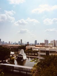 Buildings in city against sky