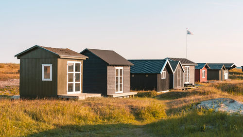 House on field against sky