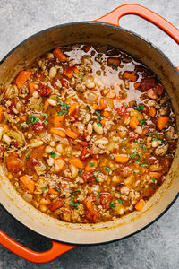 Italian sausage and white bean soup in a dutch oven