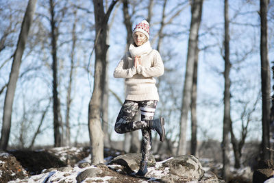 Yoga outdoor. happy woman doing yoga exercises. yoga meditation in nature. concept of health. 