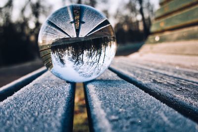 Close-up of crystal ball on table