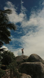 Rear view of woman walking on mountain