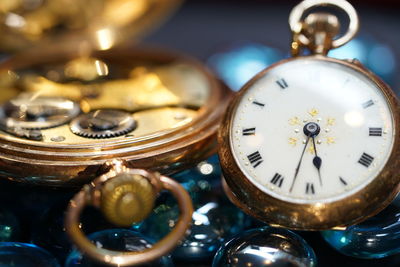Close-up of clock on table