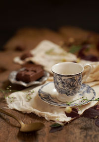 Close-up of coffee cup on table