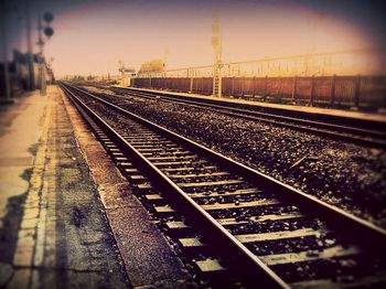 Railroad tracks on railroad station platform