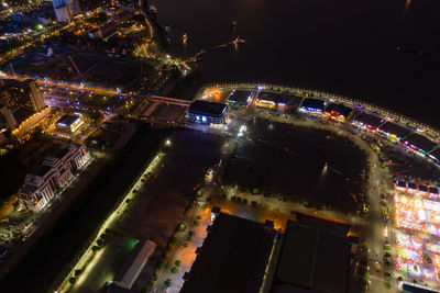 High angle view of illuminated city street at night