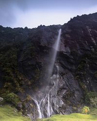 Waterfall along rocks