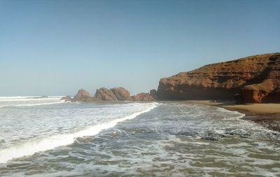 Scenic view of sea against clear sky