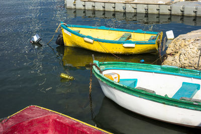 High angle view of boats moored in lake