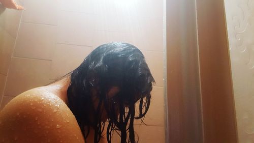 Close-up of woman in bathroom