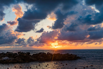 Scenic view of sea against sky during sunset