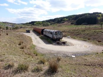 View of landscape against cloudy sky