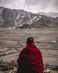 A monk watching the landscape from monastery