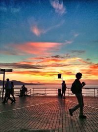 Silhouette of woman at sunset