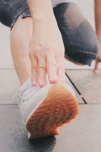 Close-up of woman holding hands