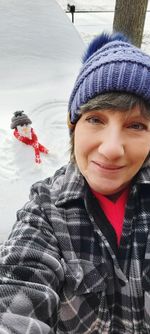 Portrait of boy in snow