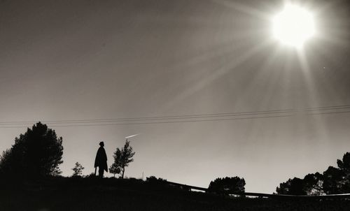 Silhouette of people at sunset