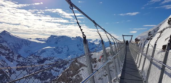 Snow covered mountain against sky