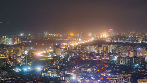 High angle view of illuminated city at night