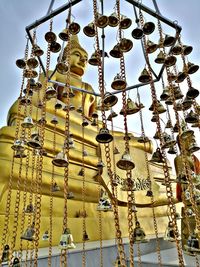 Low angle view of decoration hanging against sky