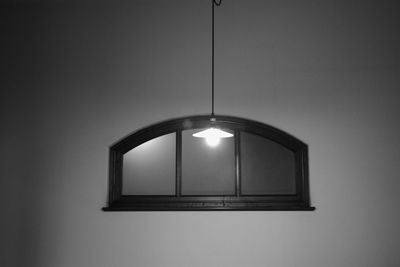 Low angle view of illuminated pendant light