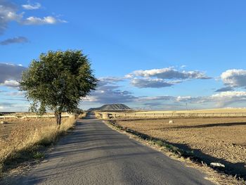 View of empty road along landscape