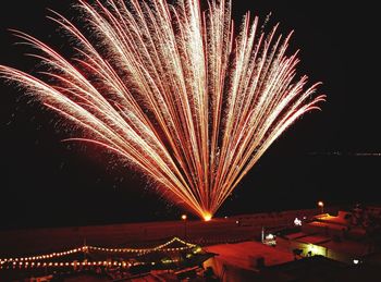 Firework display at night