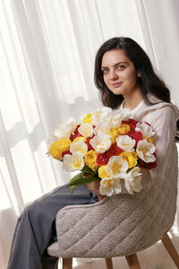 Young woman with bouquet