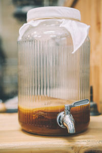 Kombucha scoby in the brewing glass jar