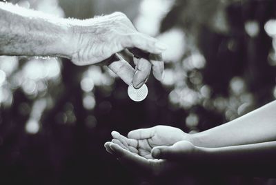 Close-up of hand holding hands