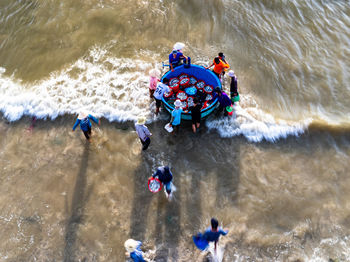 People enjoying in sea