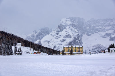 Scenic view of snowcapped mountains against sky