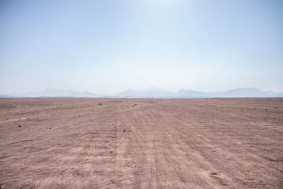 Scenic view of desert against sky