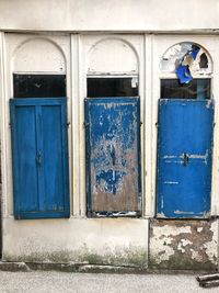 Blue closed door of old building