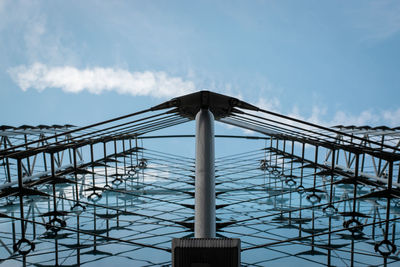 Low angle view of built structure in city against sky