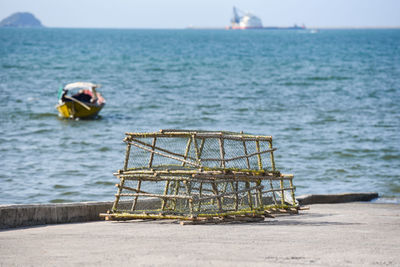 Ship in sea against sky