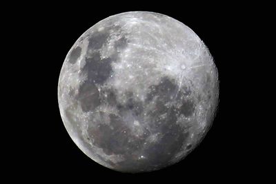 Low angle view of moon in sky