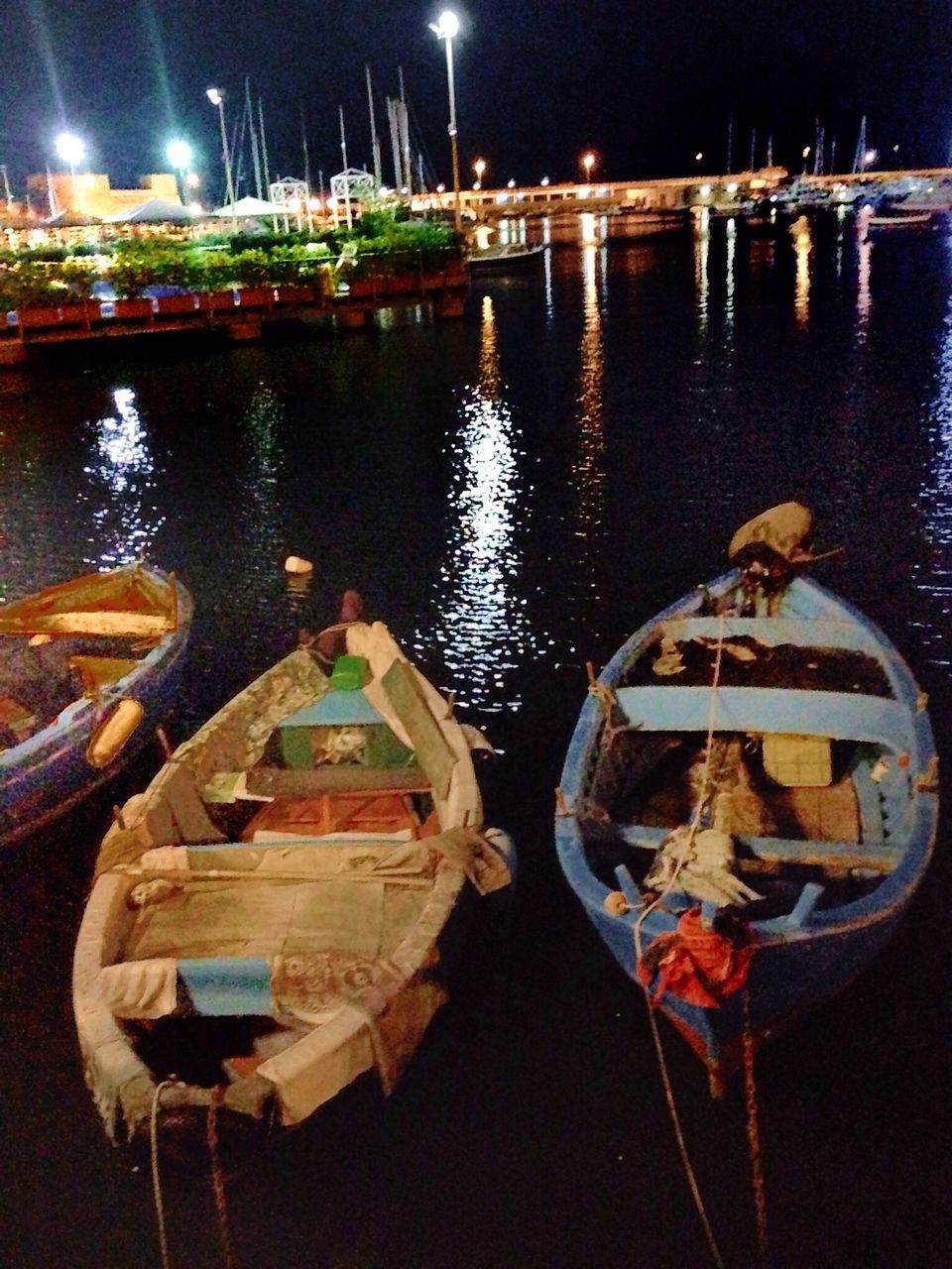 nautical vessel, water, moored, night, reflection, boat, lake, transportation, harbor, waterfront, mode of transport, illuminated, wood - material, river, no people, outdoors, rope, high angle view, nature