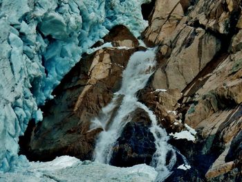 Close-up of frozen rock in water