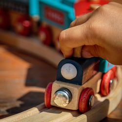 Close-up of hand holding toy