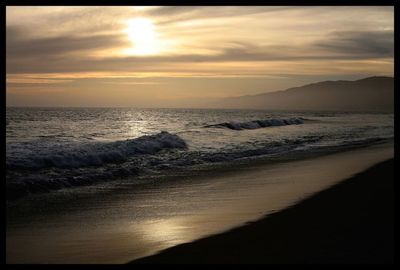 Scenic view of sea at sunset