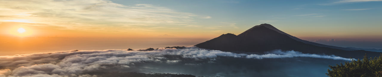 Scenic view of dramatic sky during sunset