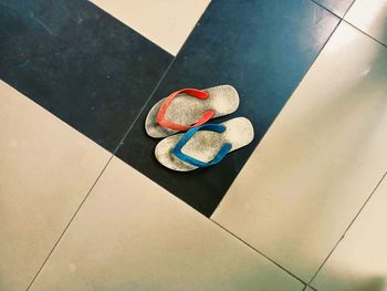 High angle view of heart shape on tiled floor