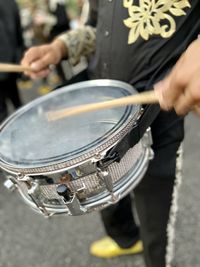 Close-up of a snare drum of a musician during the guadeloupe carnival