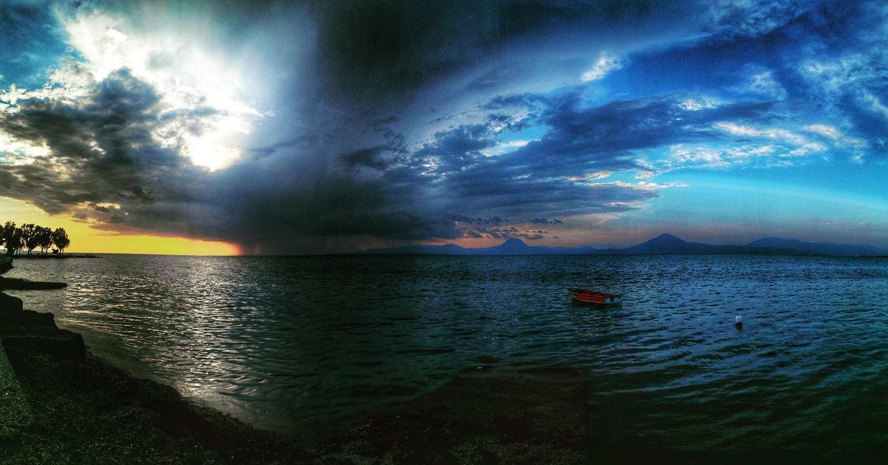 sky, cloud - sky, beauty in nature, scenics - nature, water, tranquil scene, tranquility, sunset, sea, nature, no people, idyllic, land, non-urban scene, beach, outdoors, sunlight, sunbeam