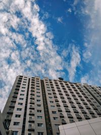 Low angle view of modern building against sky